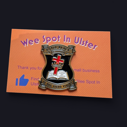Royal black pin badge