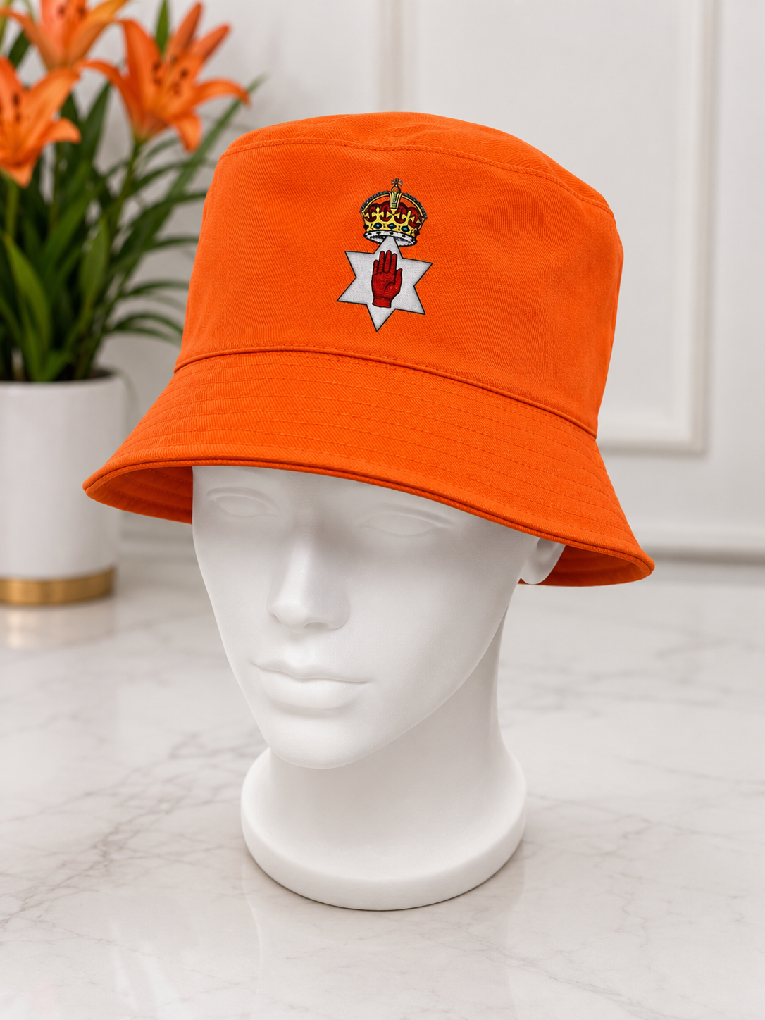 Red hand and crown orange bucket hat